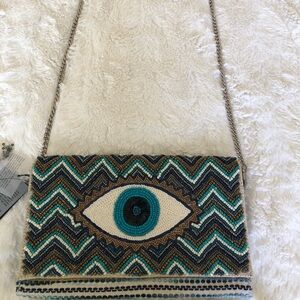 America and Beyond Grecian nights evil eye clutch